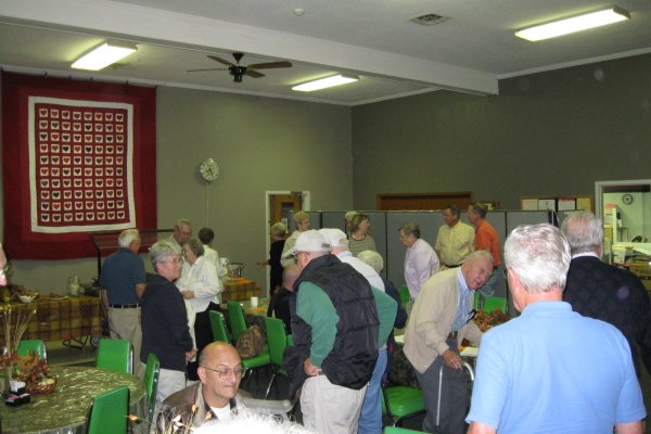 more happy volunteer mingling into the evening