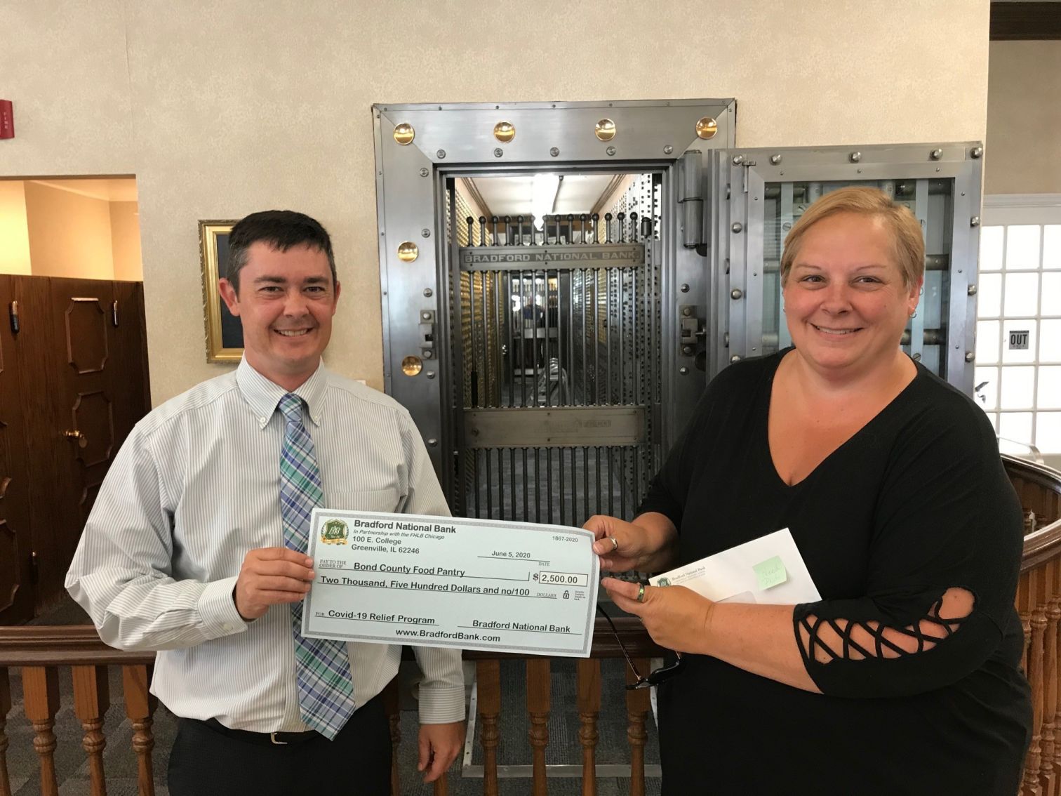 Bradford National Bank employee Adam Boudouris made the check presentation to Jennifer Jackson Senior Center Manager.